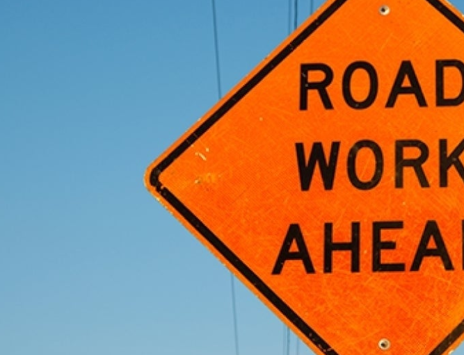 Road work ahead sign